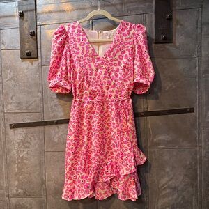 Turn heads in this pink leopard print TCEC dress—fun, flirty & versatile!